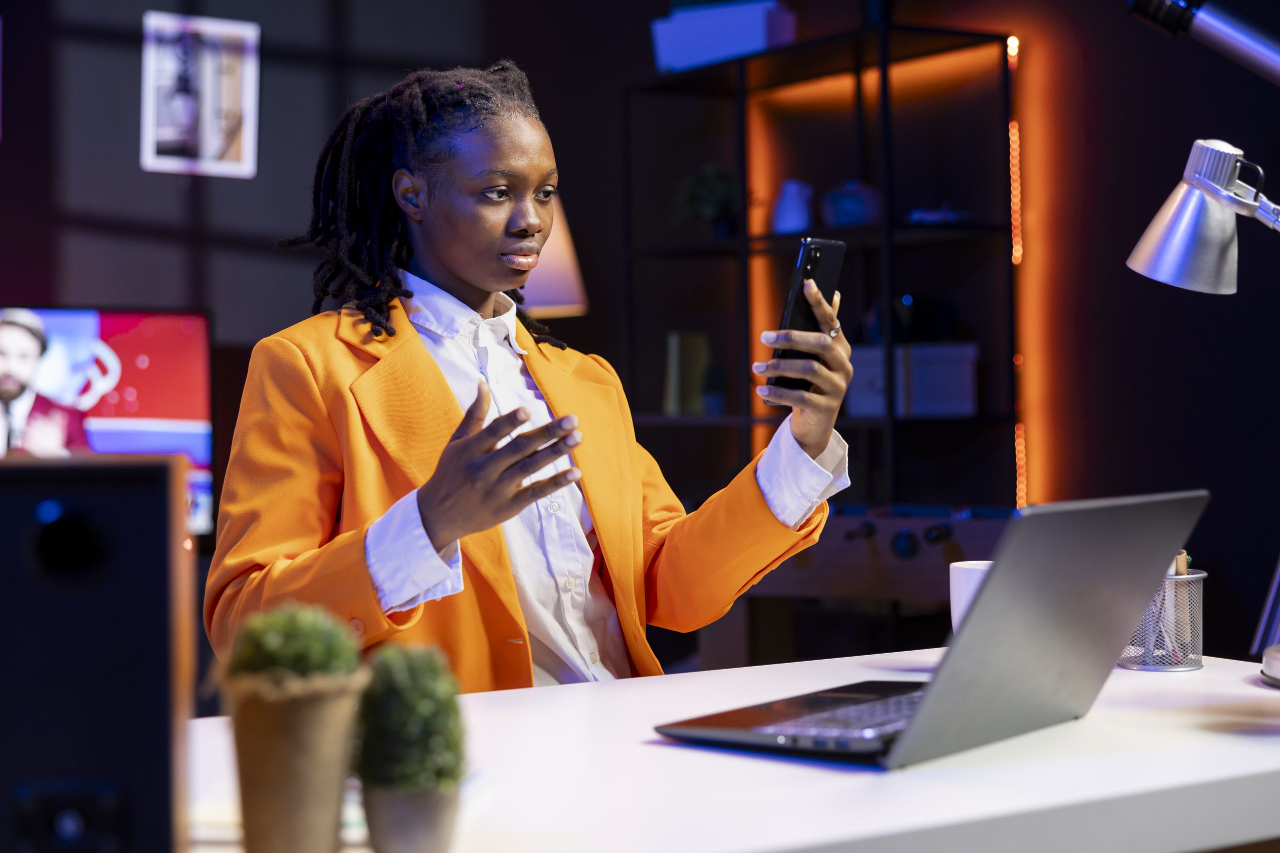 woman checking up on close friends during phone videocall
